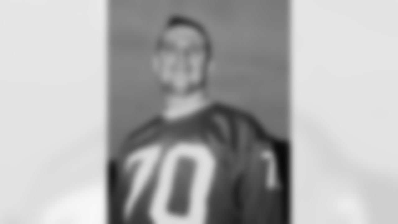 FILE - New York Giants linebacker Sam Huff poses for a photo at the NFL football team's training camp in Fairfield, Conn., in September 1963. Huff, the hard-hitting Hall of Fame linebacker who helped the Giants reach six NFL title games from the mid-1950s to the early 1960s and later became a popular player and announcer in Washington, died Saturday, Nov. 13, 2021. He was 87. (AP Photo/Harry Harris, File)
