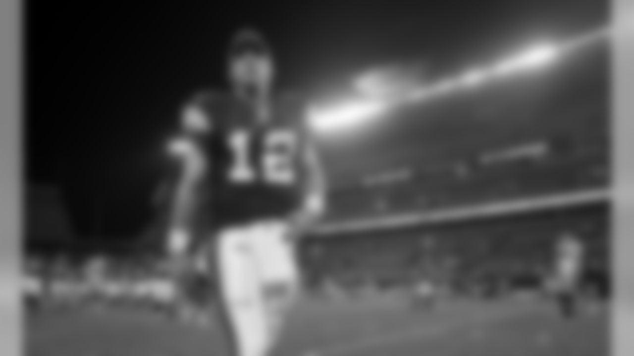 Cleveland Browns quarterback Colt McCoy walks off the field after the Browns beat the Green Bay Packers 27-17 in an NFL preseason football game Saturday, Aug. 13, 2011, in Cleveland. (AP Photo/Tony Dejak)