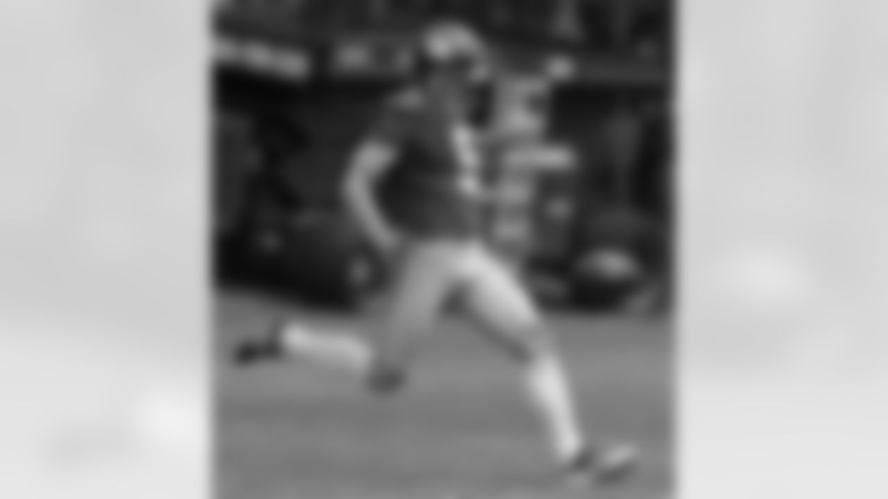 New York Giants Steve Weatherford (5) punts during a workout for special teams at the New York Giants NFL football training camp in Albany, N.Y.