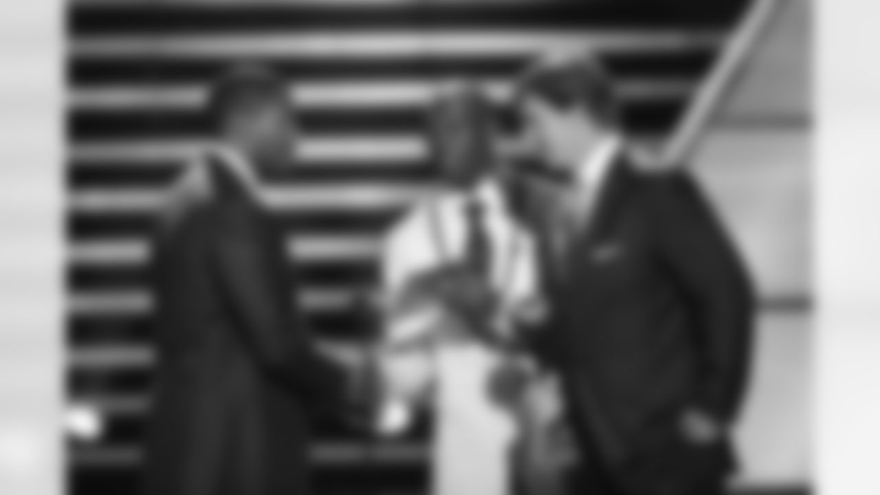 Eli Manning and Michael Strahan with Terrell Owens