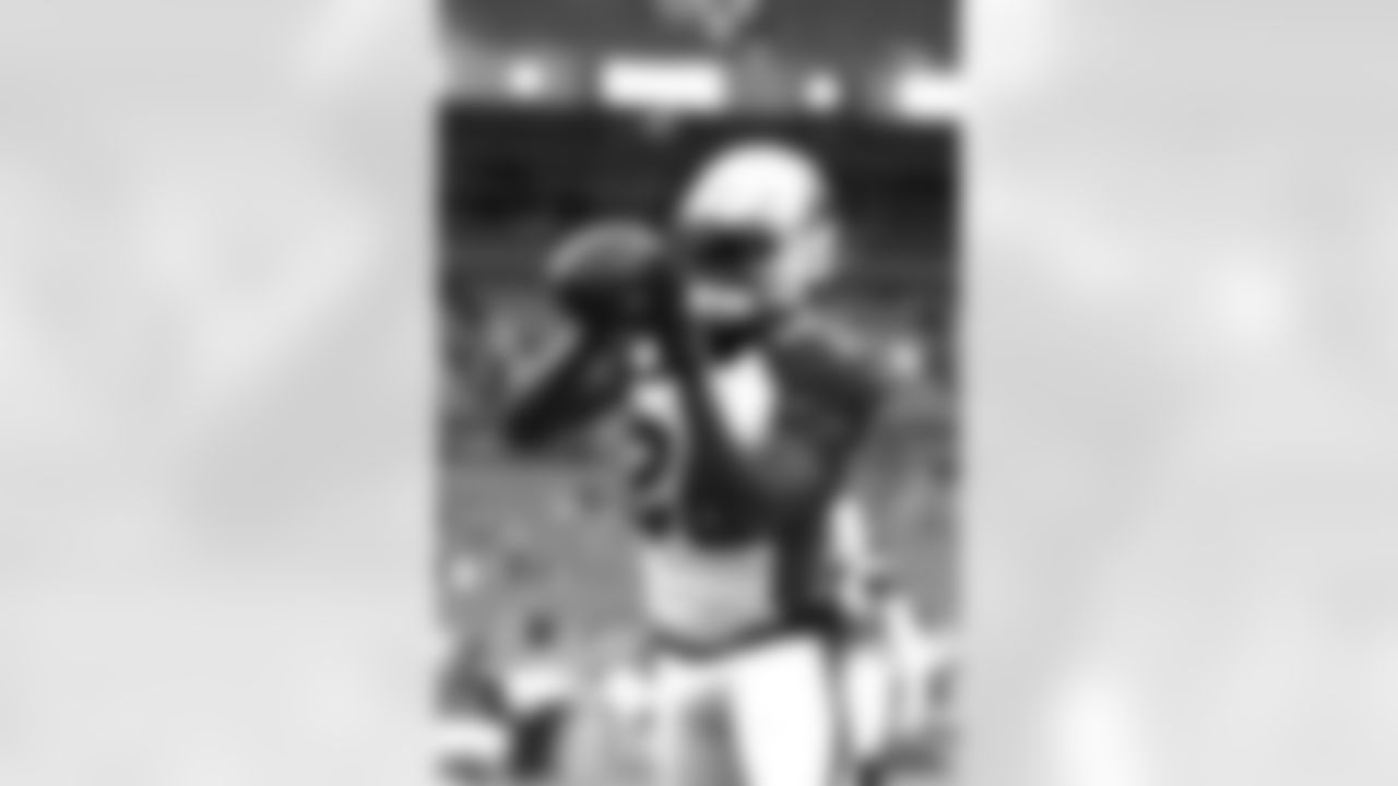 Arizona Cardinals cornerback Brandon Williams (26) catches a pass during warm-ups in an NFL preseason game against the Denver Broncos, Thursday, Aug. 29, 2019 in Denver. The Broncos defeated the Cardinals 20-7 (Margaret Bowles via AP)