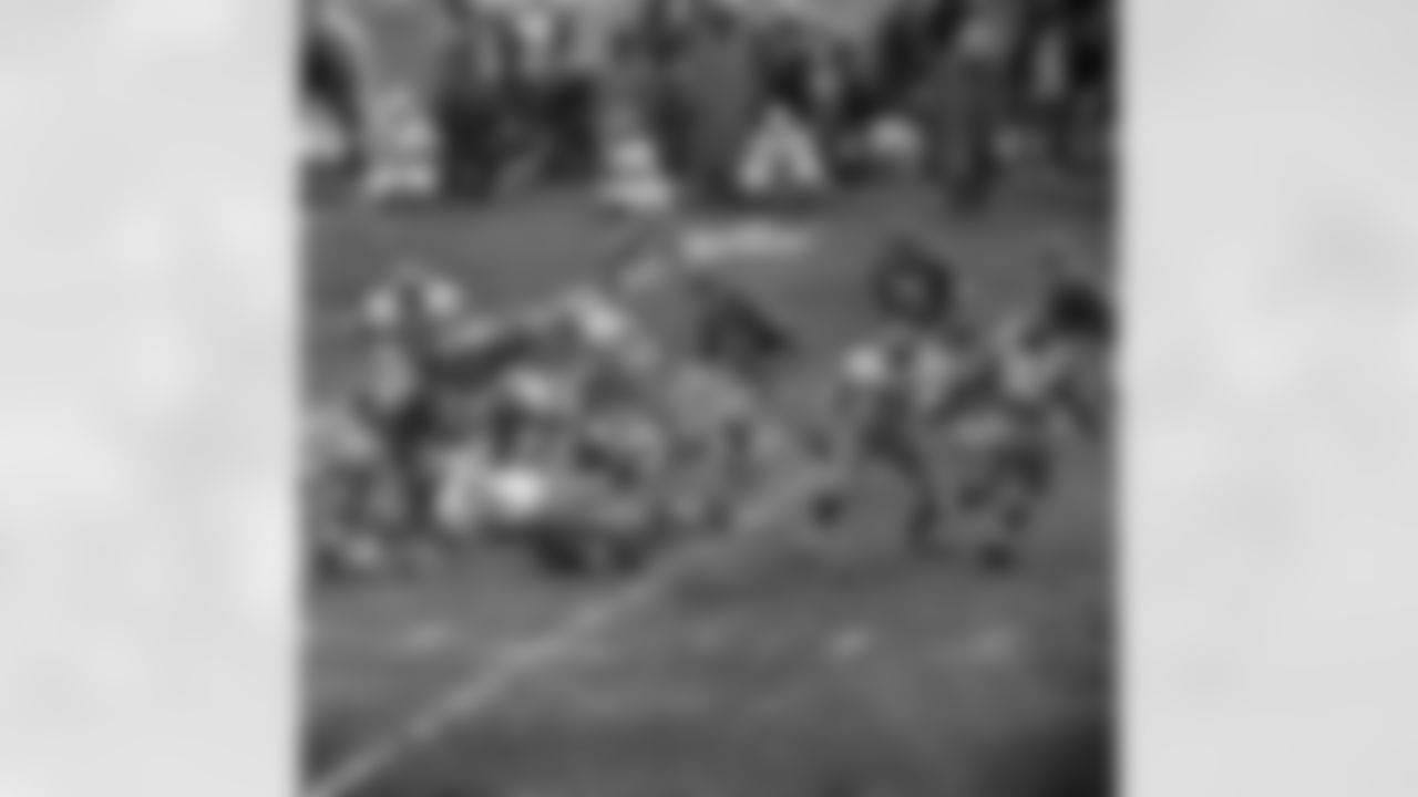 Green Bay Packers' fullback Jim Taylor (31) takes to the air as he goes through the New York Giants defense for a five-yard gain in third period of NFL championship game at New York's Yankee Stadium, Dec. 30, 1962. Identifiable Packers are Fred Thurston (63), Norm Masters (78) and Jim Ringo 951). Giants are Andy Robustelli (81), Dick Modzelewski (77) and Sam Huff (70). Green Bay won, 16-7. (AP Photo)