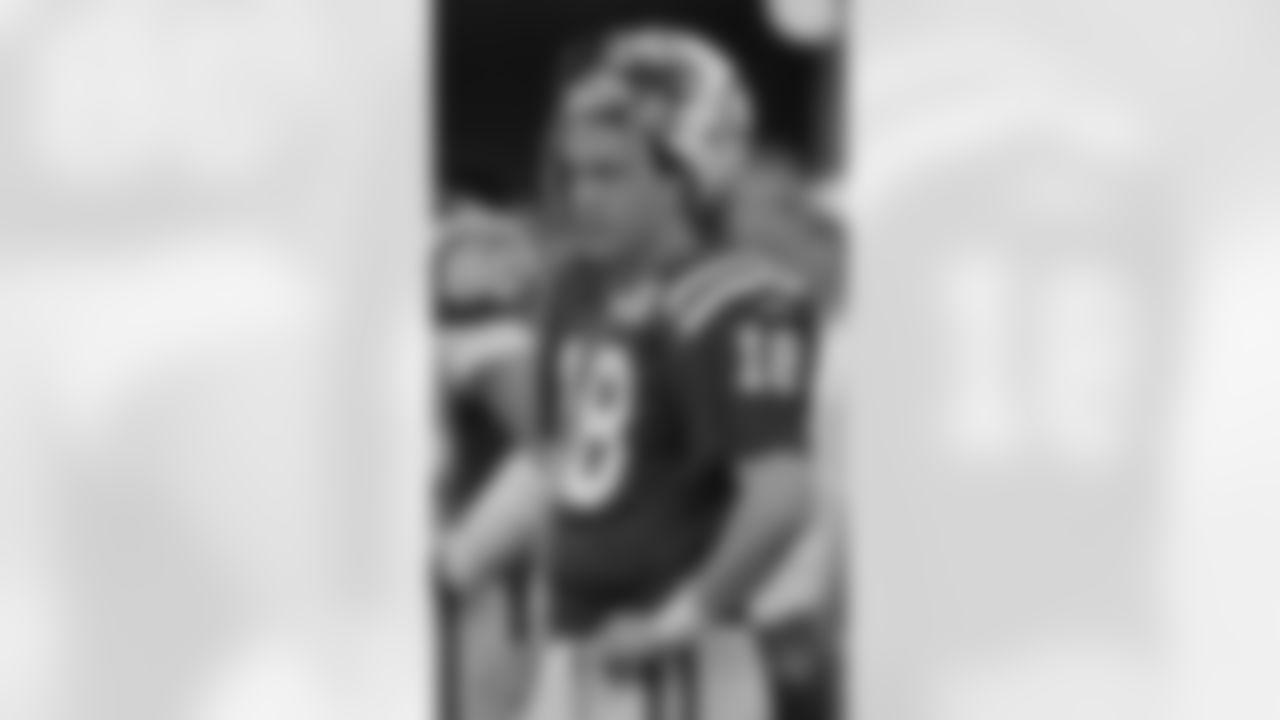 Indianapolis Colts quarterback Peyton Manning stands on the sidelines after throwing his second interception late in the fourth quarter against the New York Giants in Indianapolis, Sunday, Dec. 22, 2002. The Giants won 44-27. (AP Photo/Darron Cummings)