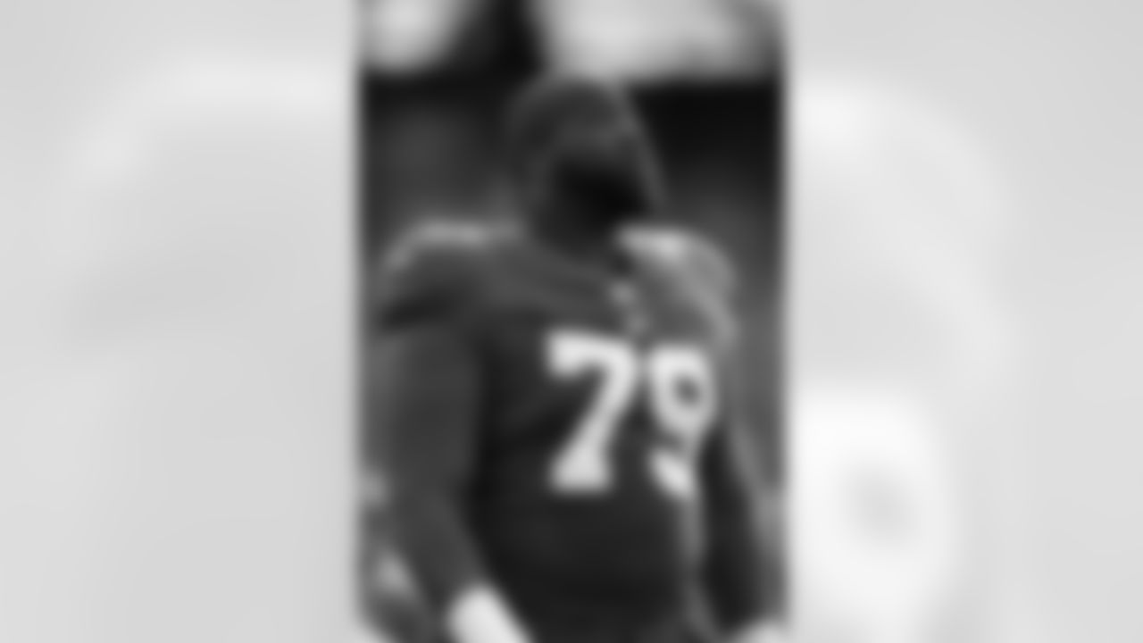 New York Giants offensive tackle Korey Cunningham (79) looks on from the sideline before an NFL football game against the Dallas Cowboys, Sunday, Dec. 19, 2021, in East Rutherford, N.J. The Dallas Cowboys defeated the New York Giants 21-6. (AP Photo/Steve Luciano)