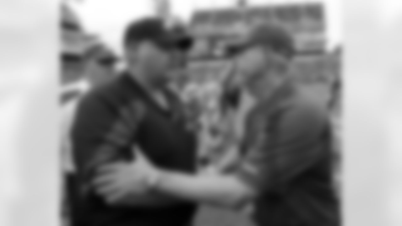 Philadelphia Eagles coach Andy Reid, left, and New York Giants coach Tom Coughlin shake hands at midfield after an NFL football game on Sunday, Sept. 25, 2011, in Philadelphia. Giants won 29-16. (AP Photo/Alex Brandon)