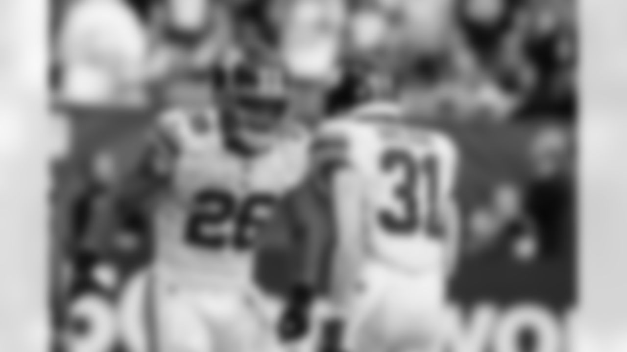 Saquon Barkley (26), Matt Breida (31)