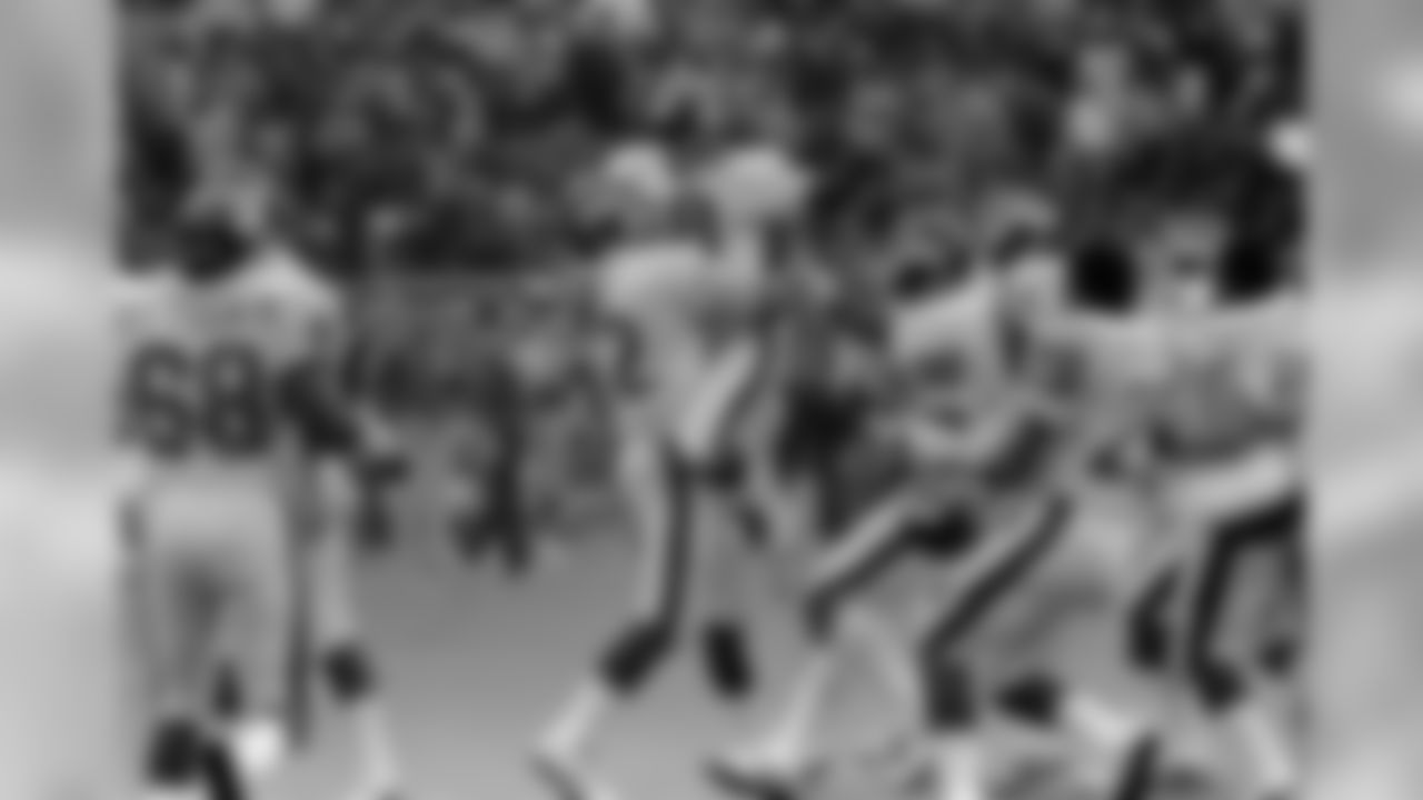 New York Giants Joe Danelo is lifted in the air by teammate Gordon King as teammates rush out onto the field to greet him after he kicked a game-winning field goal in the final seconds of Sunday, Jan. 3, 1982 NFL game at Philadelphia's Veterans Stadium. The Giants defeated the Philadelphia Eagles 26-24 (AP Photo/Rusty Kennedy)