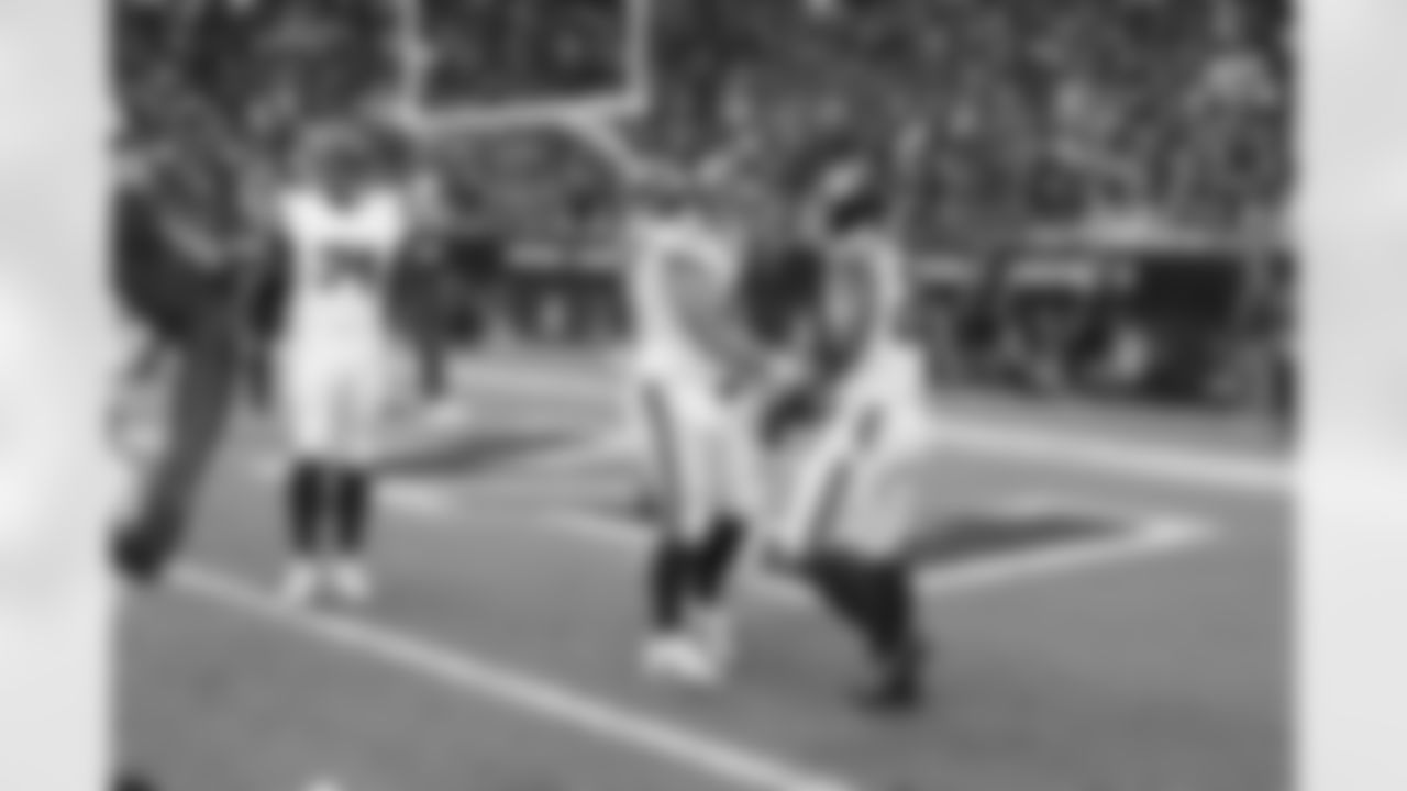 RB Saquon Barkley (26), C John Michael Schmitz Jr. (61)