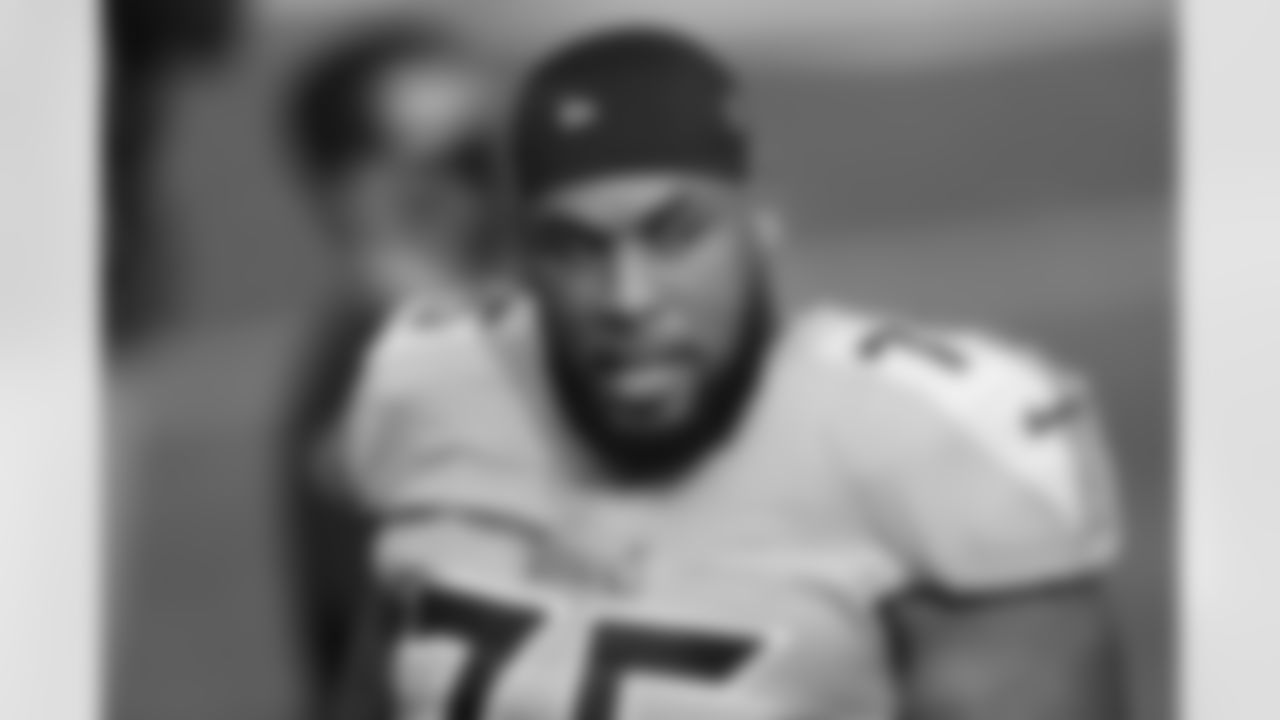 Tennessee Titans offensive guard Jamil Douglas (75) watches from the sideline in the first half of an NFL football game against Sunday, Dec. 6, 2020, in Nashville, Tenn. (AP Photo/Wade Payne)