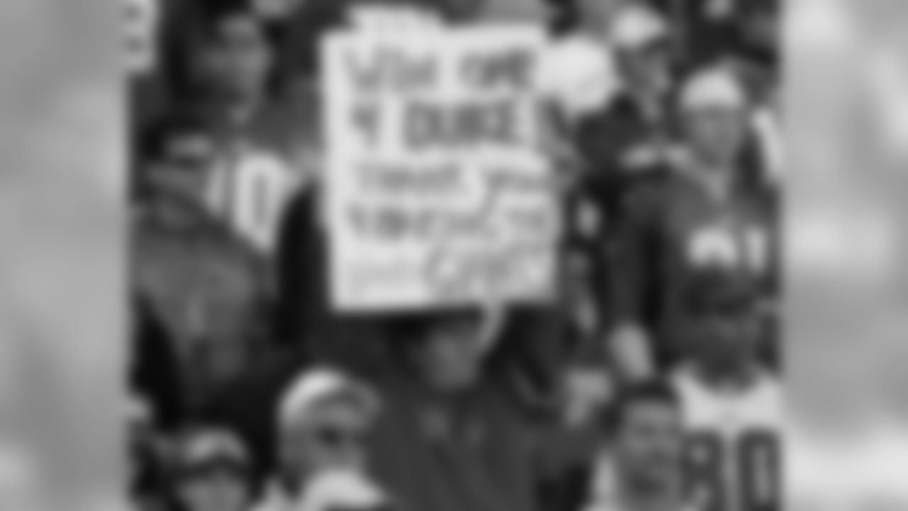 A New York Giants fan holds up a sign in tribute to Giants owner Wellington Mara, who died Tuesday at age 89, before the Giants shutout the Washington Redskins 36-0, Sunday, Oct. 30, 2005, at Giants Stadium in East Rutherford, N.J. (AP Photo/Kathy Willens)
