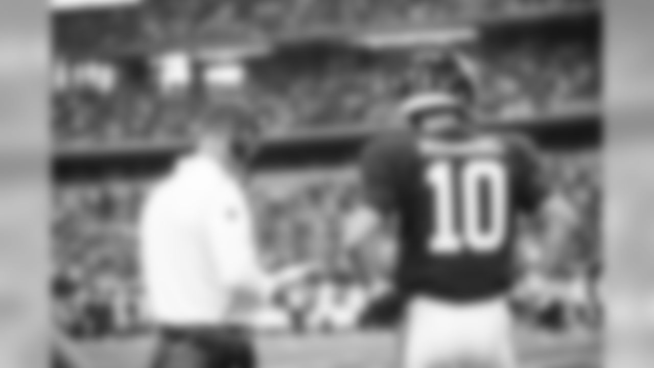 New York Giants QB Eli Manning (10) & Head Coach Pat Shurmur during week 1 game against the Dallas Cowboys in Arlington, TX