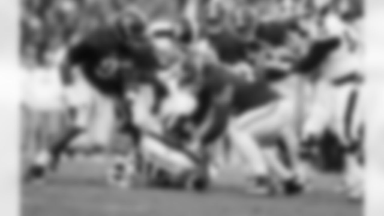 Mississippi State quarterback Dak Prescott (15) is sacked by Alabama defensive lineman Dalvin Tomlinson (54) during the first half of an NCAA college football game Saturday, Nov. 15, 2014, in Tuscaloosa, Ala. (AP Photo/Brynn Anderson)