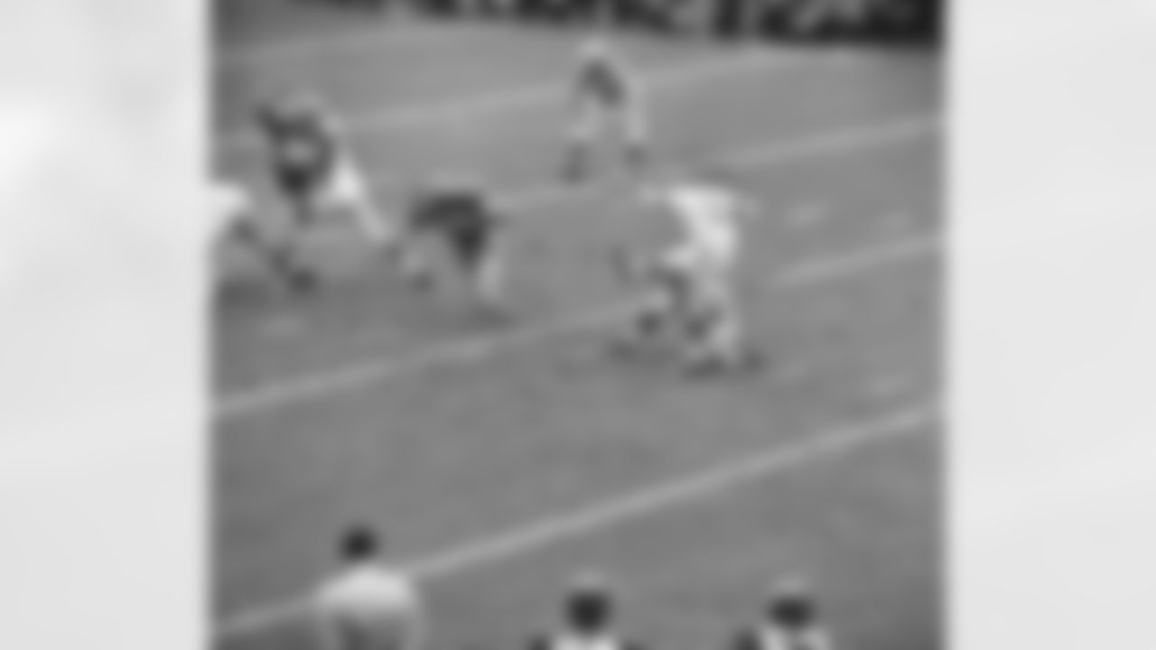 Erich Barnes (49), New York Giants halfback, blocks field goal attempt by Los Angeles Rams' Danny Villanueva (11) in first period of NFL game in New York's Yankee Stadium, Oct. 22, 1961. Los Angeles quarterback Frank Ryan (15) held the ball for Villanueva. (AP Photo)