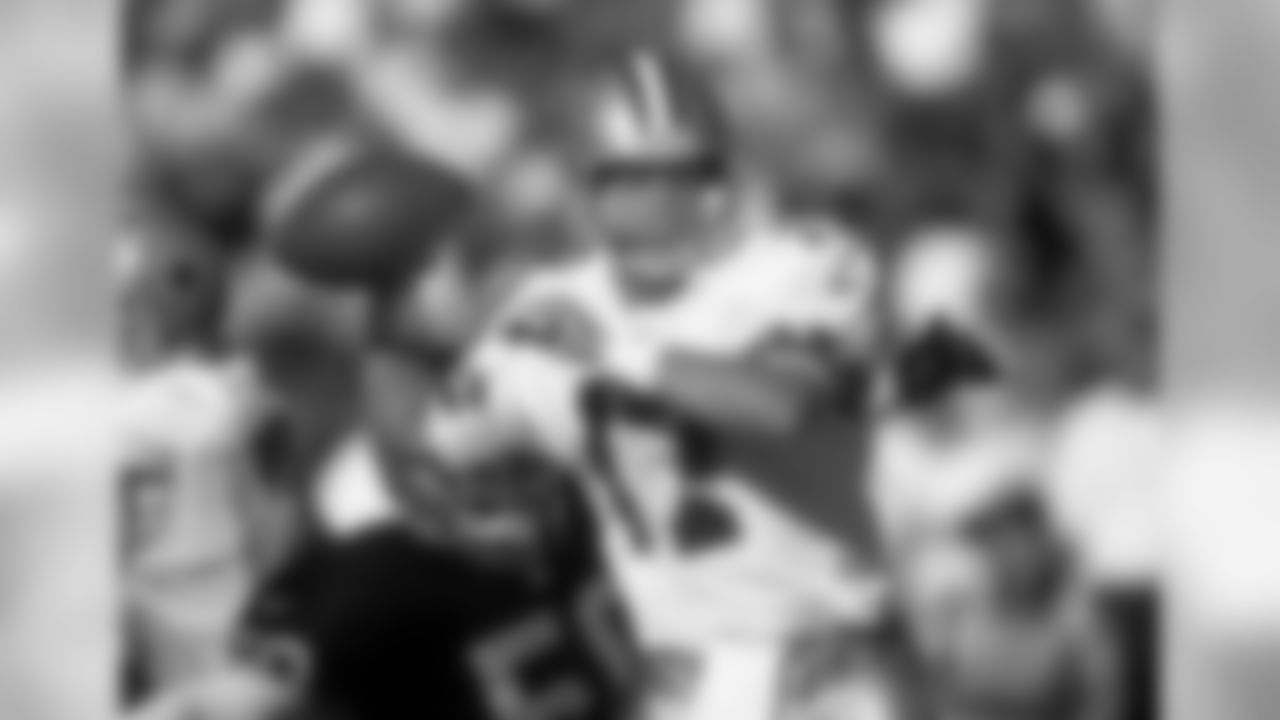 Dallas Cowboys quarterback Jason Garrett (17) passes during an NFL football game against the Oakland Raiders on Sunday, Aug. 15, 1999, in Oakland. The Raiders won the game, 10-3. (AP Photo/Greg Trott)