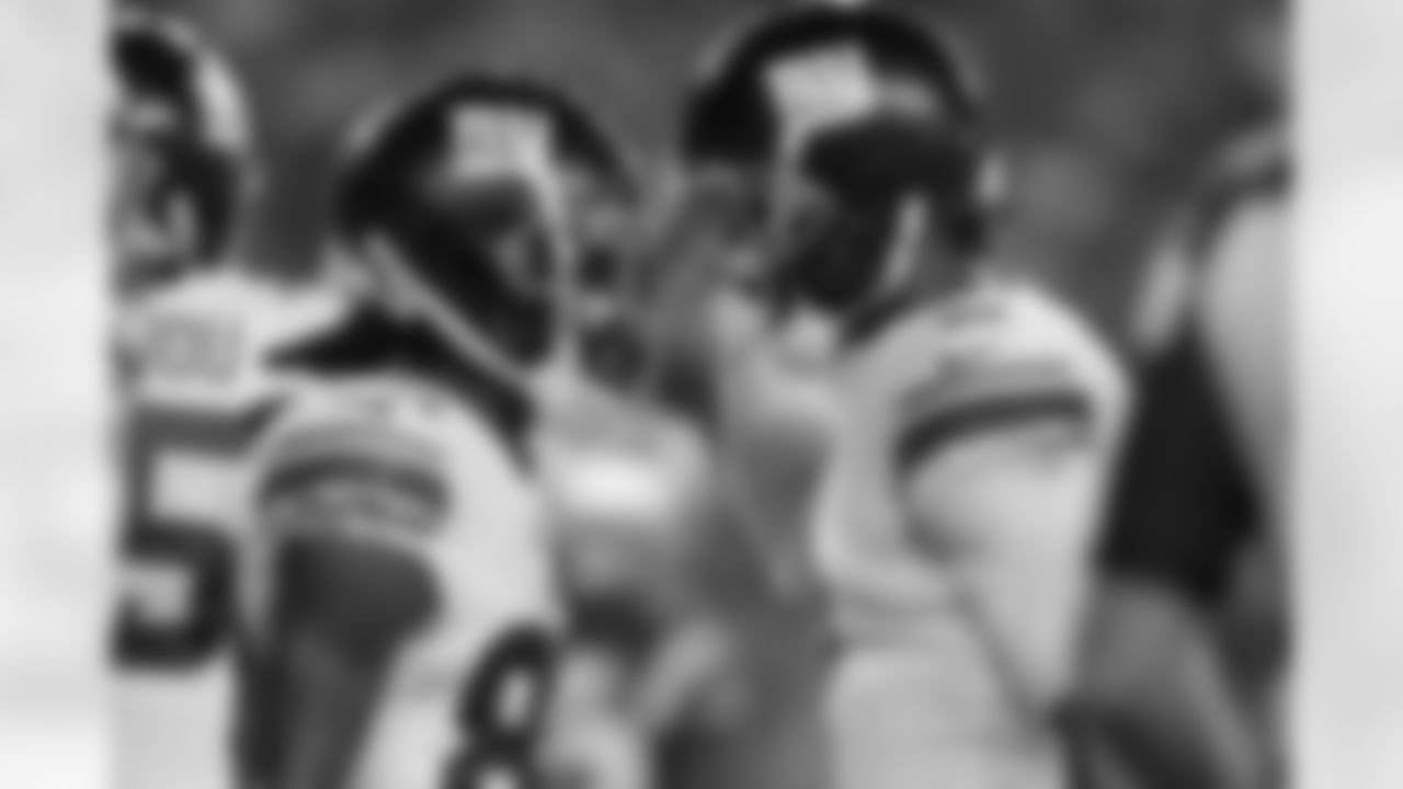 New York Giants wide receiver Richie James, left, celebrates his touchdown against the New England Patriots with quarterback Tyrod Taylor during the first half of a preseason NFL football game Thursday, Aug. 11, 2022, in Foxborough, Mass. (AP Photo/Charles Krupa)