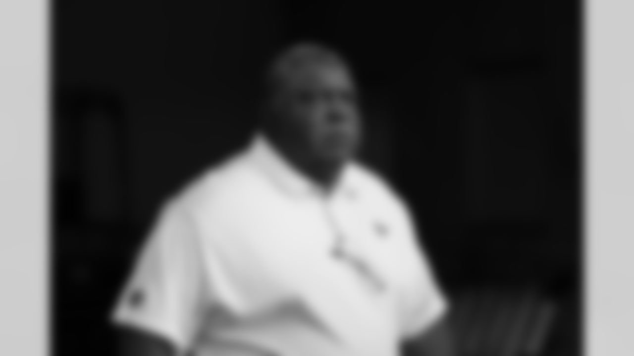 Houston Texans defensive coordinator Romeo Crennel walks to the field prior to an NFL football game against the Cincinnati Bengals on Thursday, Sept. 14, 2017, in Cincinnati. Houston won 13-9. (Aaron M. Sprecher via AP)