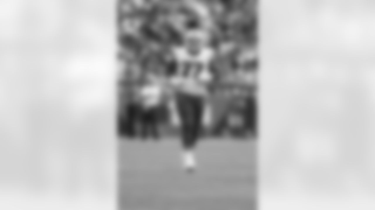 Buffalo Bills offensive guard Jamil Douglas (77) runs during an NFL preseason football game against the Chicago Bears, Saturday, Aug. 21, 2021, in Chicago. The Bills defeated the Bears 41-15. (Scott Boehm via AP)