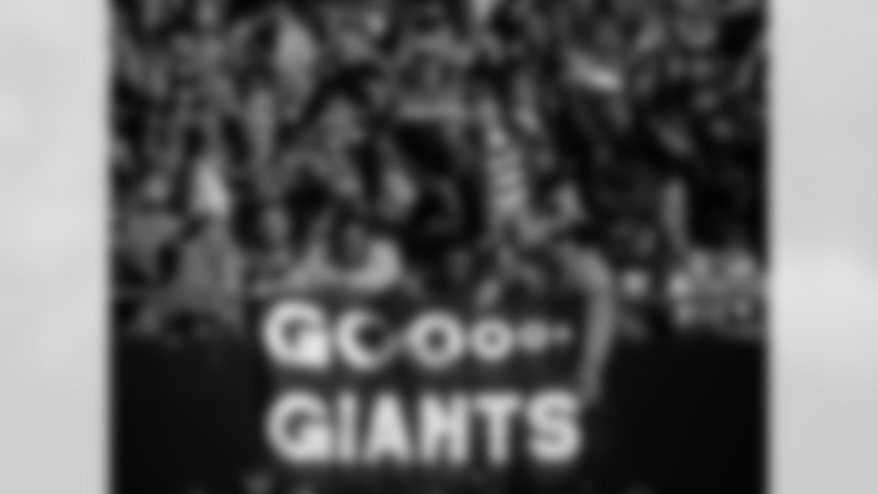 New York Giants fans in the stands show spirit during the Giants 49-3 victory over the San Francisco 49ers in the 1986 NFC Divisional Playoff Game on January 4, 1987 at Giants Stadium in East Rutherford, New Jersey. (AP Photo / Al Messerschmidt)