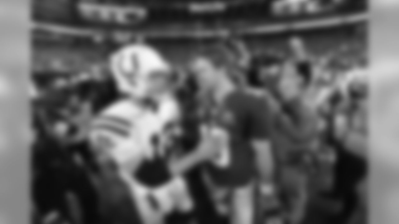Indianapolis Colts quarterback Andrew Luck (12) talks with New York Giants quarterback Eli Manning (10) after a week 9 football game against the Indianapolis Colts on November 3, 2014 in East Rutherford, New Jersey
(AP Photo/Evan Pinkus)
