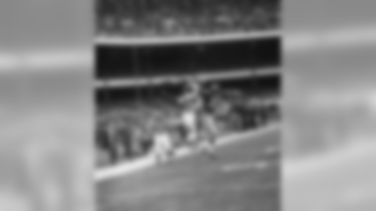 End Charley Taylor, 42, of the Washington Redskins leaps in vain for pass from quarterback Sonny Jurgensen which goes out of reach in first quarter against New York Giants at Yankee Stadium on Sept. 29, 1968 in New York. Giants' defensive back Scott Eaton, 20, matches leaps with Taylor in a try to deflect the ball. (AP Photo)
