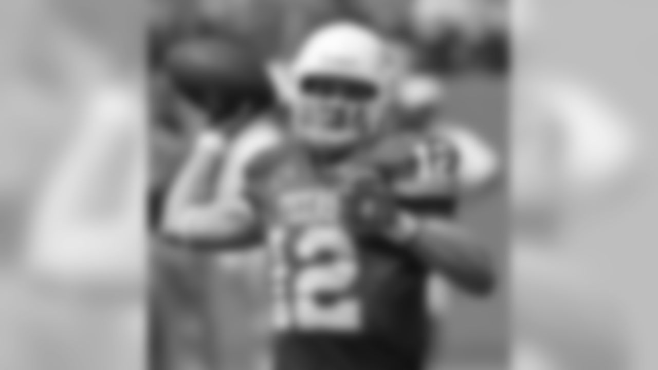 Texas redshirt freshman quarterback Colt McCoy prepares to pass to a receiver during first quarter college football action against North Texas Saturday, Sept. 2, 2006, in Austin, Texas. (AP Photo/Harry Cabluck)
