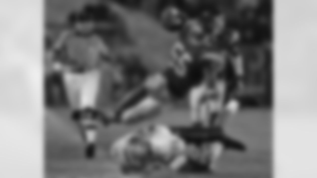 In this Oct. 23, 2004 file photo, Southern California's Keith Rivers, top, is tackled by quarterback Casey Paus after Rivers intercepted his pass in the second half of a college football game in Los Angeles. Rivers is a top prospect in the 2008 NFL Draft.