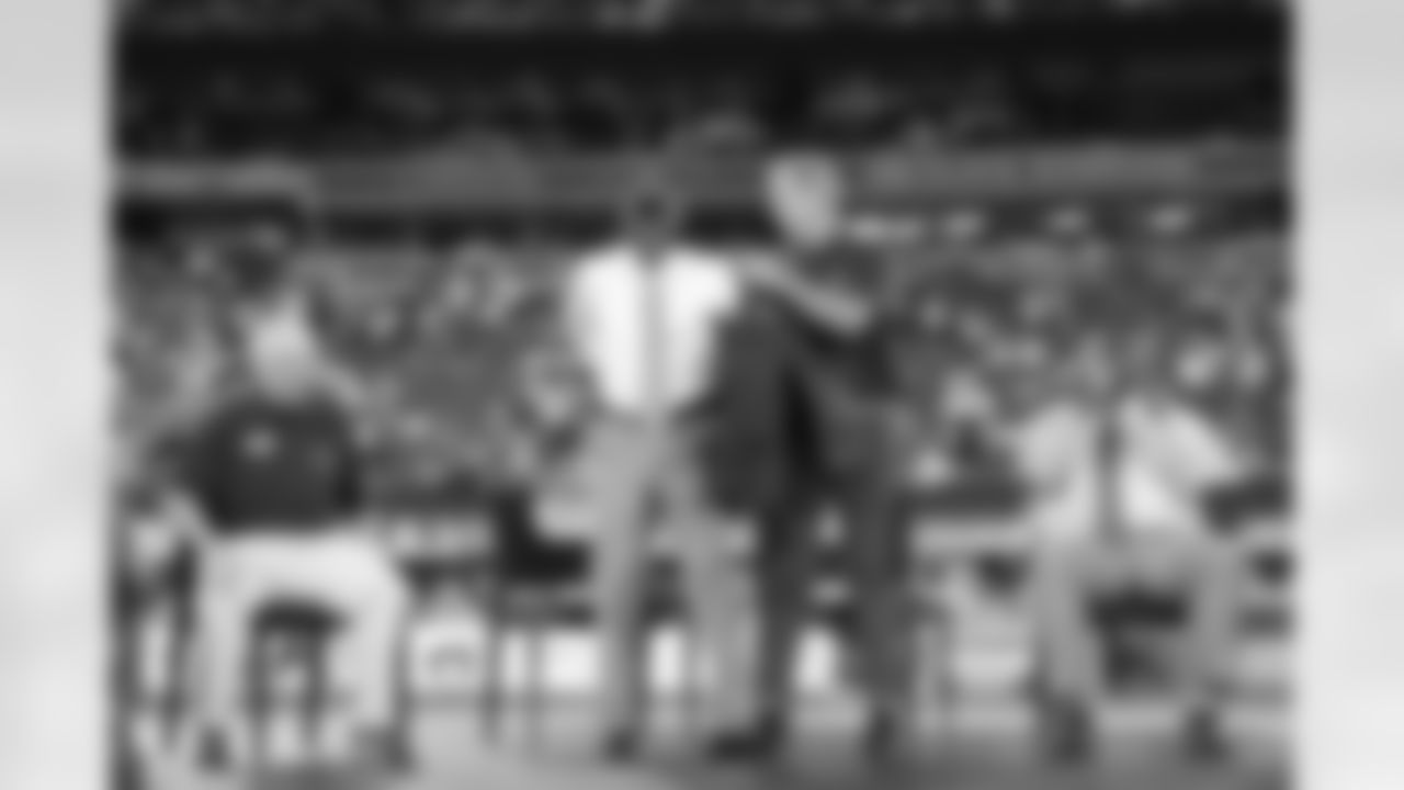 Ronnie Barnes receives his ring of honor jacket from Brad Daluiso during a Monday Night football game against the Dallas Cowboys on Monday September 26, 2022 in East Rutherford, New Jersey (Evan Pinkus/NY Giants)