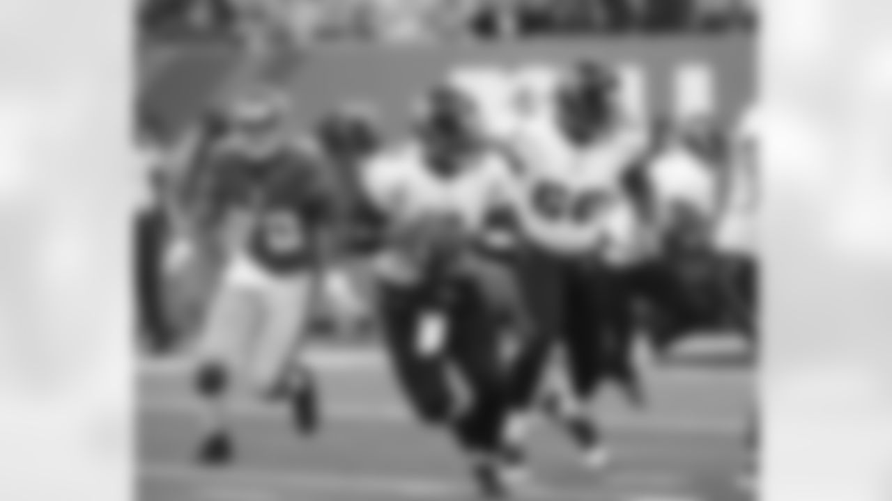 Osi Umenyiora pressured QB David Garrard and flushed him outside the pocket throughout the game