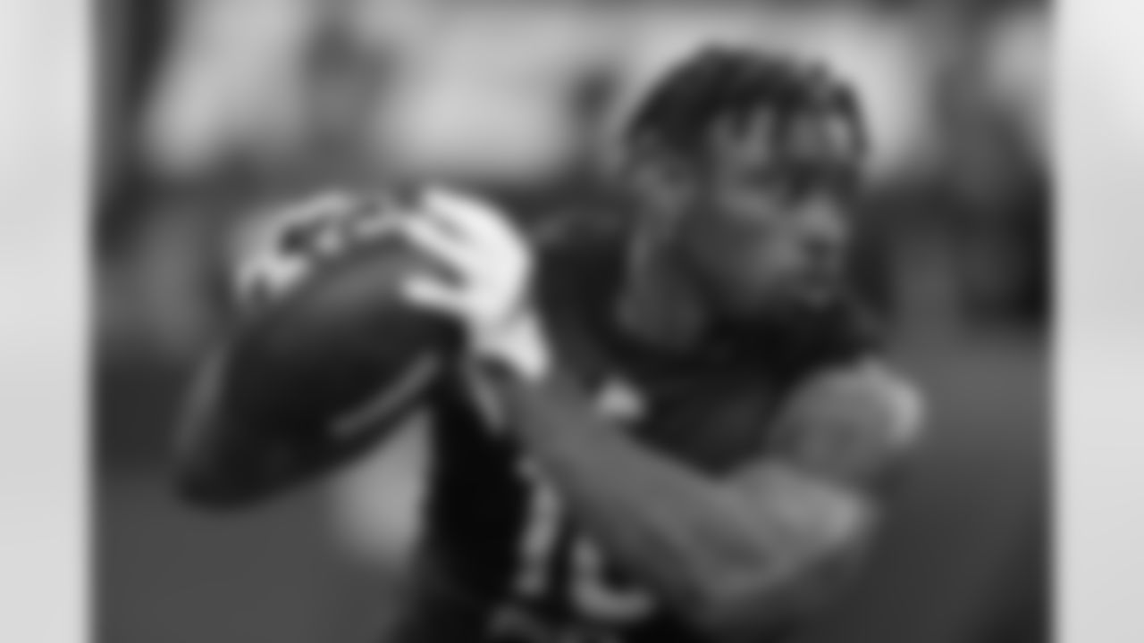 Iowa running back Tyler Goodson catches a pass at the NFL football scouting combine in Indianapolis, Friday, March 4, 2022. (AP Photo/Charlie Neibergall)