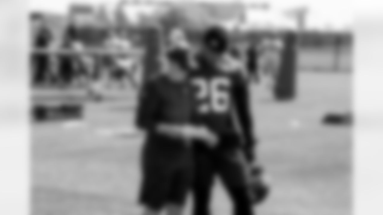 Director of Coaching Operations Laura Young, RB Saquon Barkley (26)