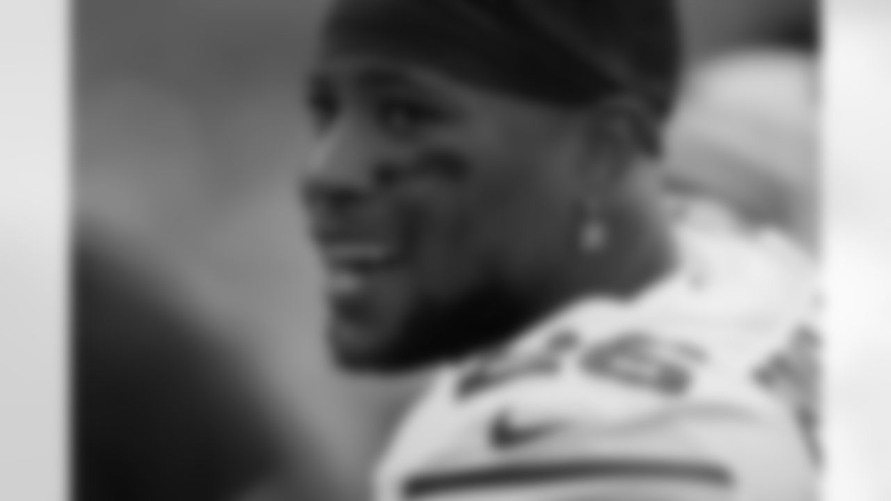 New York Giants running back Saquon Barkley (26) looks on from the bench during the first half of an NFL football game against the Los Angeles Chargers Sunday, Dec. 12, 202), in Inglewood, Calif. (AP Photo/Ashley Landis