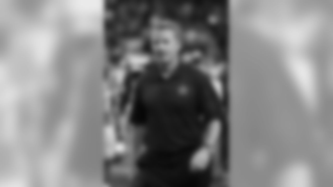 Dallas Cowboys head coach Jason Garrett walks off the field after losing an NFL football game against the Detroit Lions in Detroit, Sunday, Oct. 27, 2013. (AP Photo/Rick Osentoski)