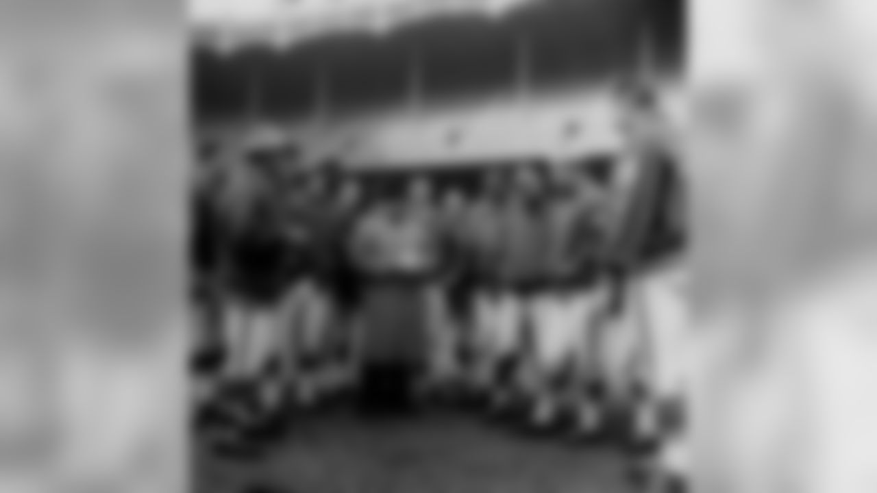 Baltimore Colts head coach Weeb Ewbank briefs his team for the next day's title game against the New York Giants at Yankee Stadium in New York in this Dec. 27, 1958 photo. (AP Photo)