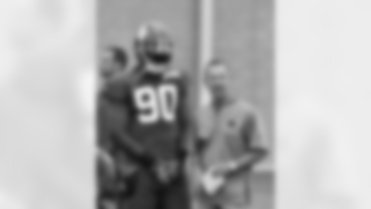 New York Giants defensive end Jason Pierre-Paul (90) talks with defensive coordinator Steve Spagnuolo during NFL football training camp practice on July 29, 2017 in East Rutherford, N.J. (Evan Pinkus via AP)