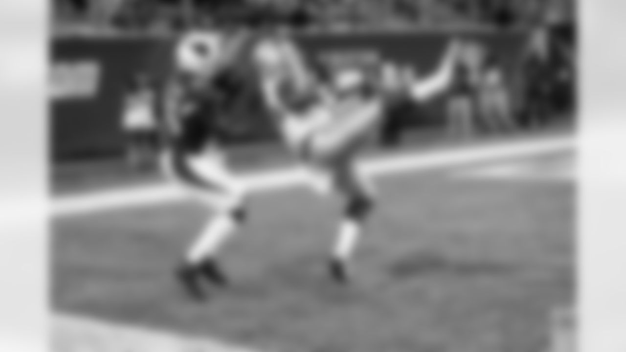 Arizona Cardinals cornerback Brandon Williams (26) intercepts an end zone pass intended for leaping Dallas Cowboys rookie wide receiver Noah Brown (85) late in the second quarter during the 2017 NFL Pro Football Hall of Fame preseason football game against the Dallas Cowboys on Thursday, Aug. 3, 2017 in Canton, Ohio. The Cowboys won the game 20-18. (Paul Spinelli via AP)