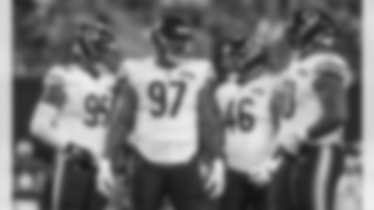 Chicago Bears defensive end Roy Robertson-Harris (95), defensive tackle Nick Williams (97), linebacker James Vaughters (46) and defensive end Jonathan Bullard (90) wait during a break in play against the New York Giants during the second quarter of a preseason NFL football game, Friday, Aug. 16, 2019, in East Rutherford, N.J. (AP Photo/Sarah Stier)