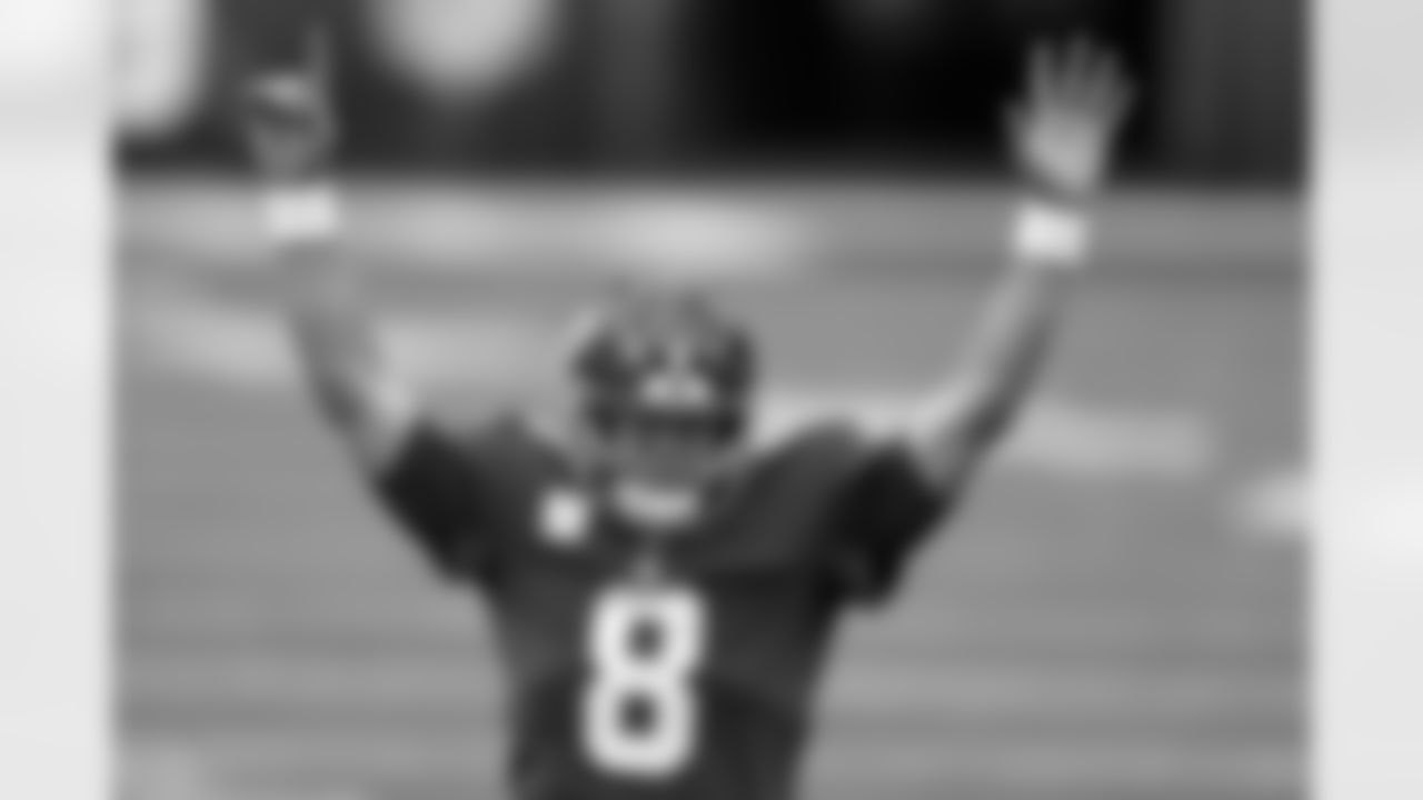 New York Giants quarterback Daniel Jones (8) reacts to a touchdown during an NFL football game against the Philadelphia Eagles, Sunday, Nov. 15, 2020, in East Rutherford, N.J. (AP Photo/Adam Hunger)