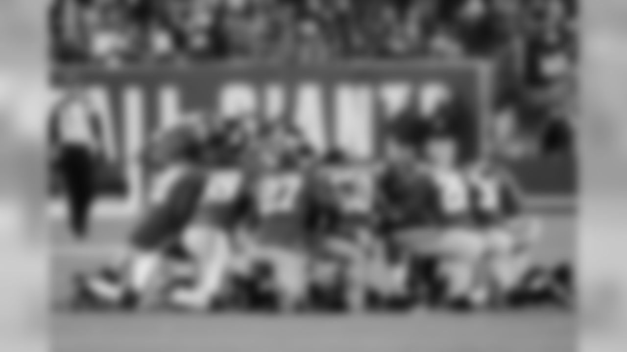 The New York Giants defense huddles during the first half of an NFL football game against the Green Bay Packers