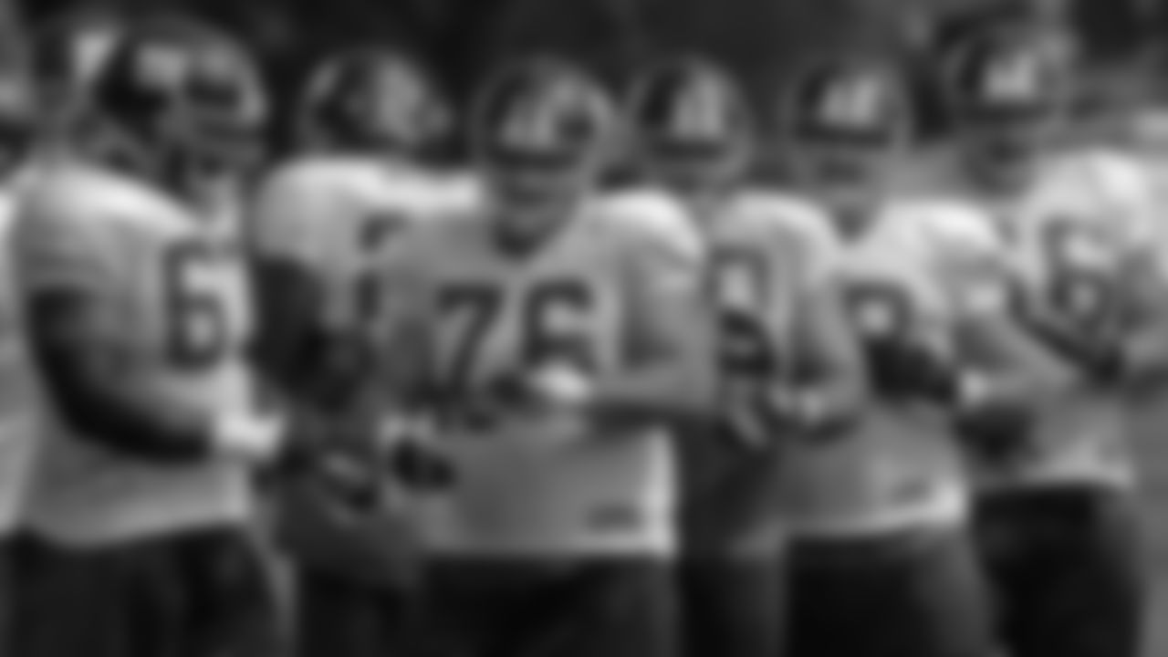New York Giants offensive linemen Kareem McKenzie (67), Chris Snee (76), Shaun O'Hara (60), Rich Seubert (69), and David Diehl (66) break huddle during football training camp in Albany, N.Y., Monday, July 28, 2008. (AP Photo/Mike Groll)