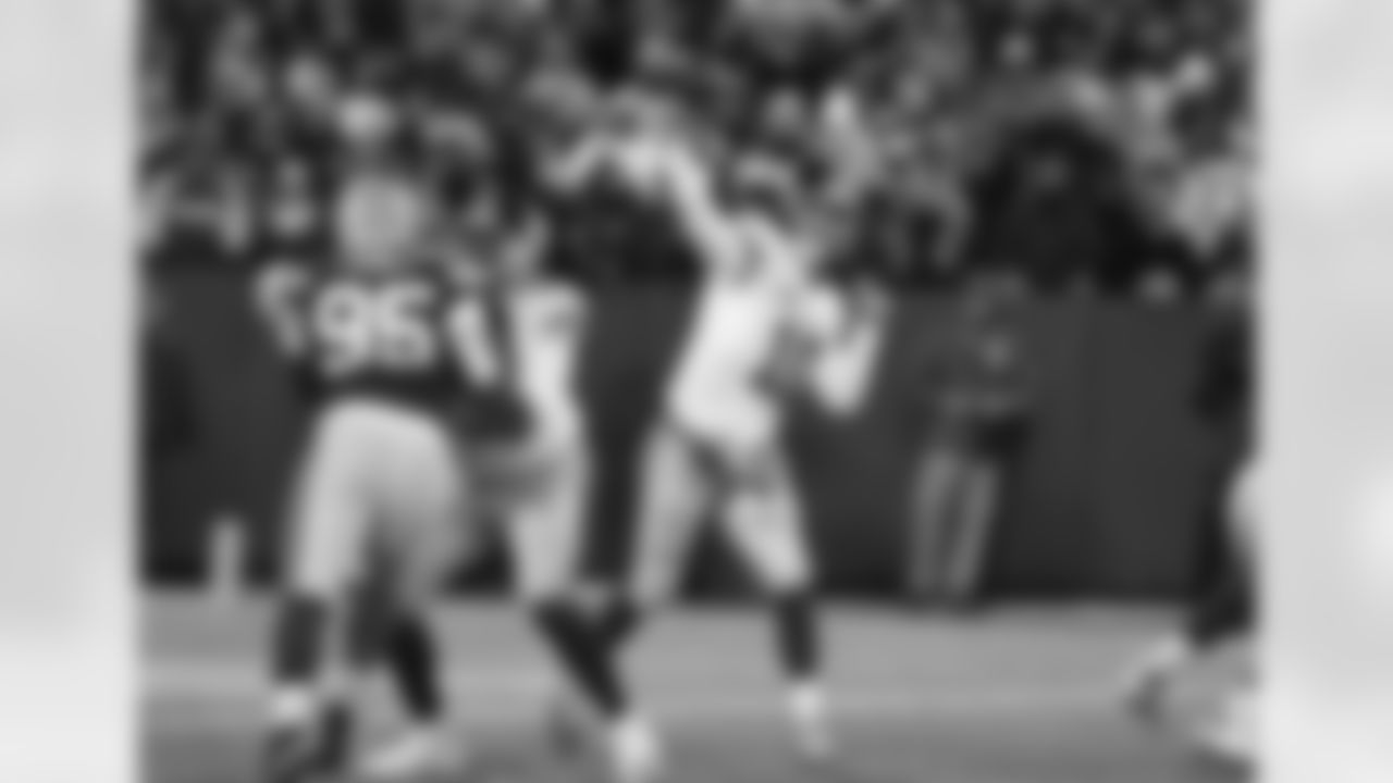 New York Giants quarterback Eli Manning (10) releases a pass against the Green Bay Packers during an NFL football NFC wildcard playoff game Jan. 8, 2017 in Green Bay, Wis. (Al Messerschmidt via AP)