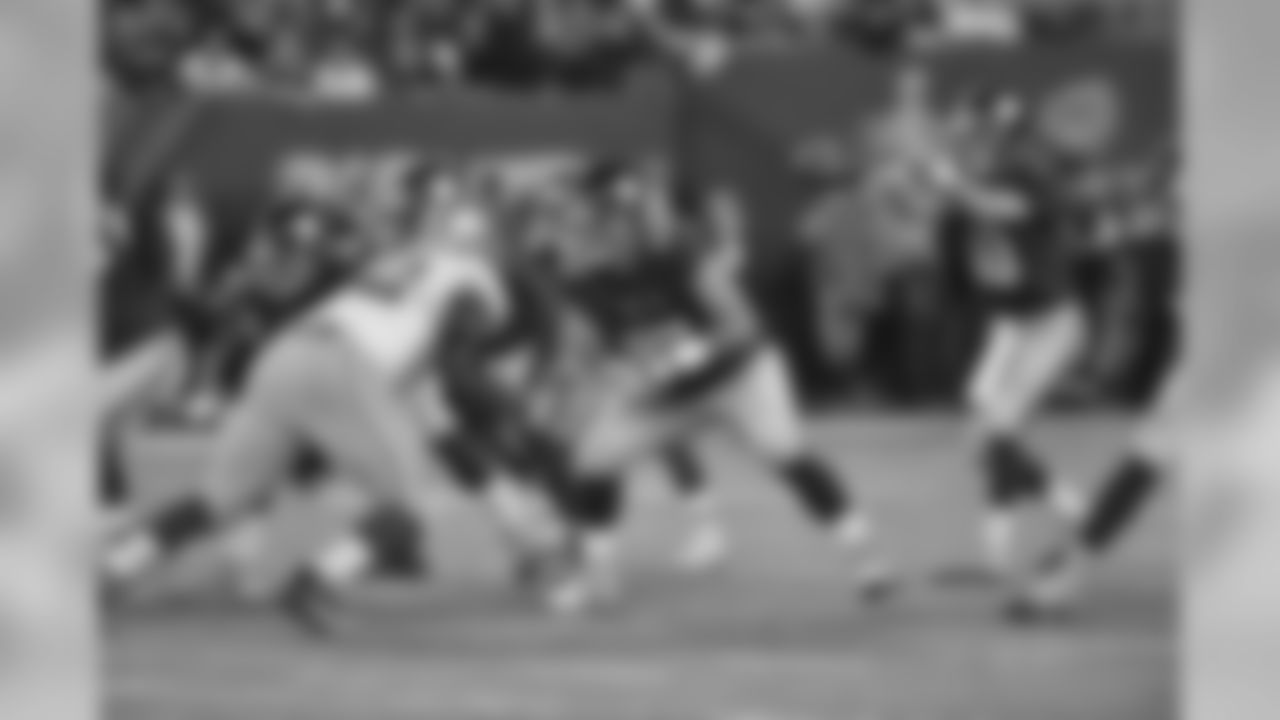 QB ELI MANNING, RT JUSTIN PUGH
