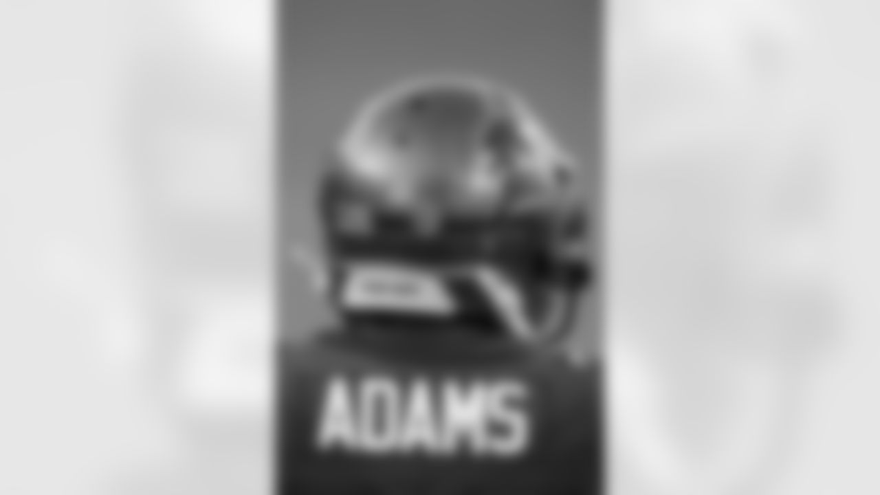 Tampa Bay Buccaneers safety Andrew Adams (26) wears a Stop Hate decal on his helmet as he warms up on the field before taking on the Kansas City Chiefs during an NFL football game, Sunday, Nov. 29, 2020, in Tampa, Fla. (AP Photo/Doug Murray)