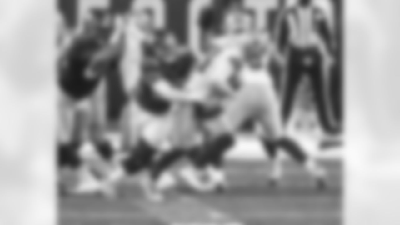 New York Giants defensive end Leonard Williams (99) sacks Dallas Cowboys quarterback Andy Dalton (14) during a week 17 regular season football game at MetLife Stadium on January 3, 2021 in East Rutherford, New Jersey