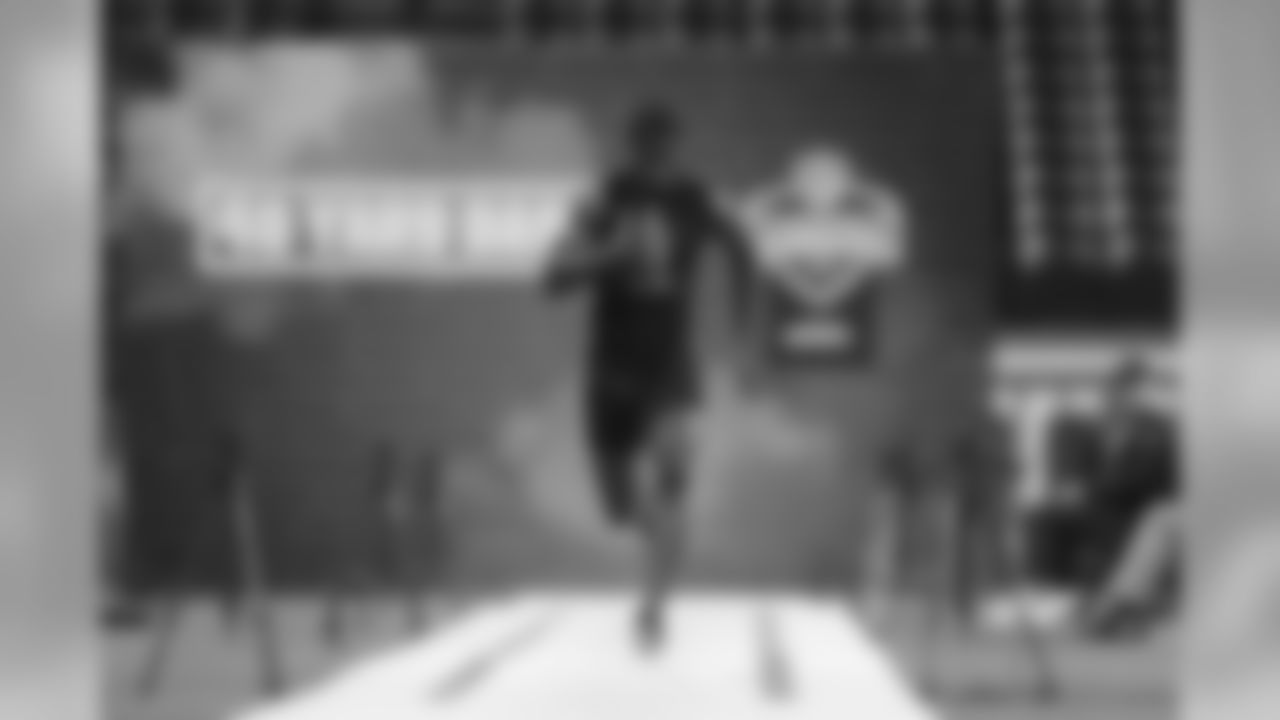 Cam Brown runs the 40-yard dash during the 2020 NFL Scouting Combine, Saturday, Feb. 29, 2020 in Indianapolis. (Ben Liebenberg via AP)