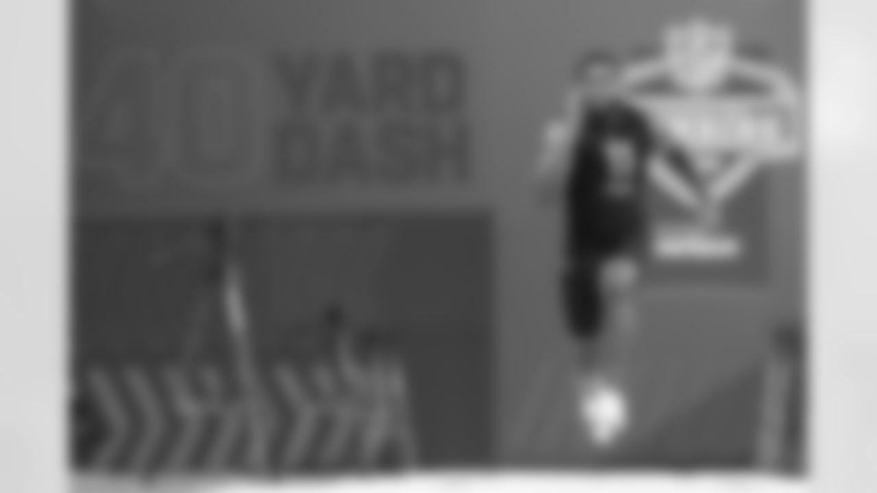 LSU running back Ty Davis-Price runs the 40-yard dash during the NFL football scouting combine, Friday, March 4, 2022, in Indianapolis. (AP Photo/Darron Cummings)