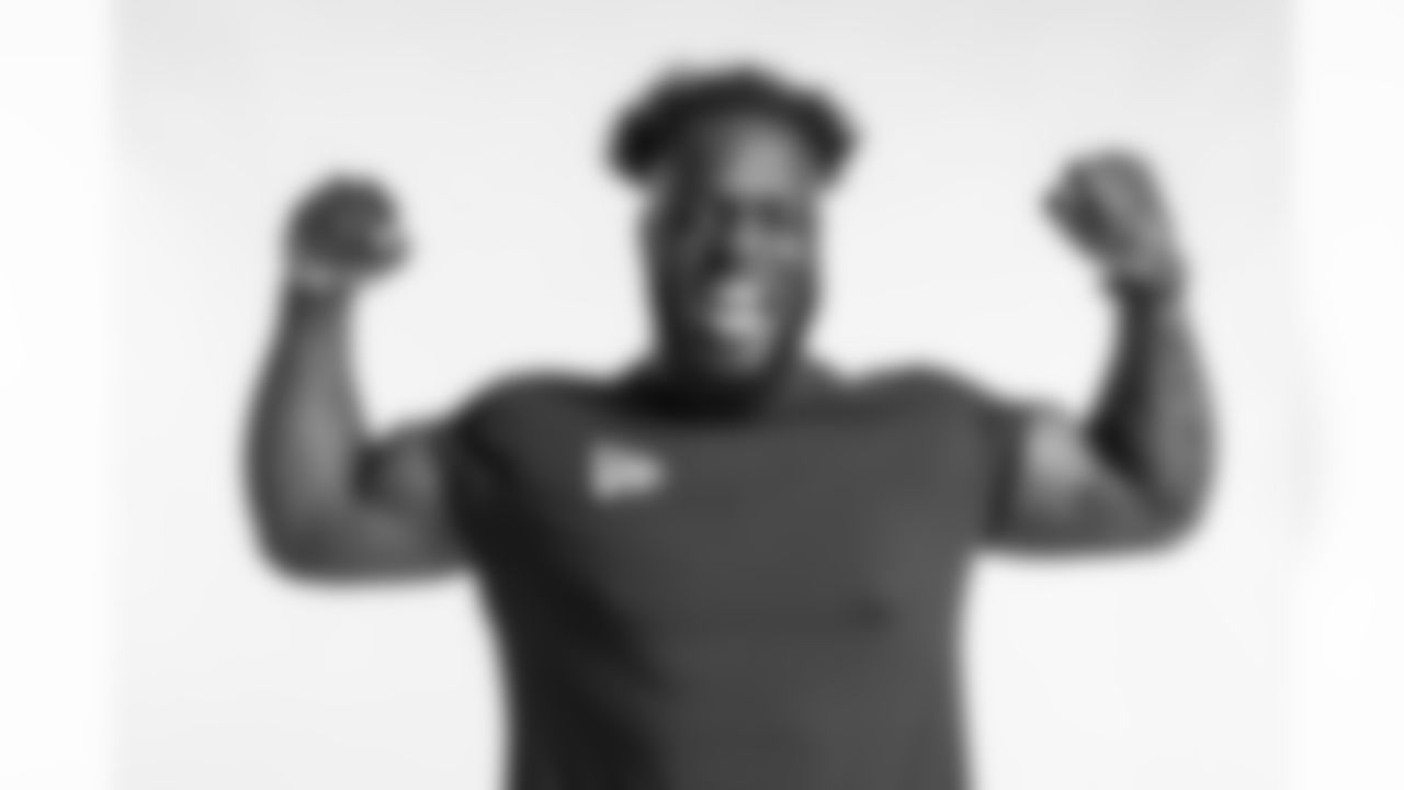 Michigan defensive end Kwity Paye poses for a portrait Saturday, March 6, 2021 in Phoenix. (Todd Rosenberg via AP)