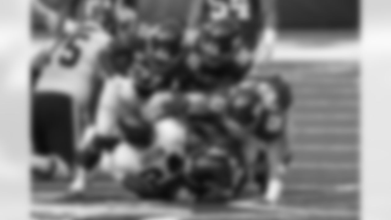 Washington Football Team running back Antonio Gibson (24) is tackled by New York Giants strong safety Jabrill Peppers (21), New York Giants nose tackle Austin Johnson (98), New York Giants outside linebacker Kyler Fackrell (51) and New York Giants nose tackle Dalvin Tomlinson (94) during an NFL football game, Sunday, Oct. 18, 2020, in East Rutherford, N.J. (AP Photo/Adam Hunger)