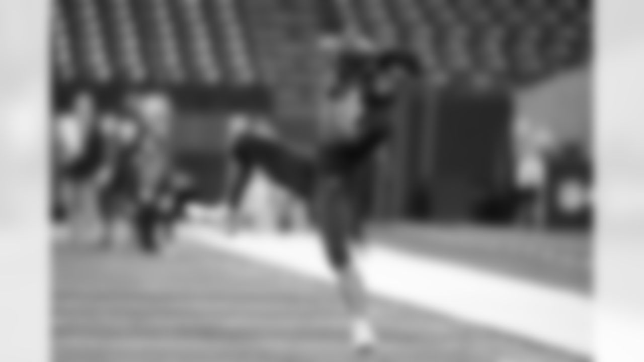 Ohio State wide receiver Garrett Wilson runs a drill during the NFL football scouting combine, Thursday, March 3, 2022, in Indianapolis. (AP Photo/Darron Cummings)
