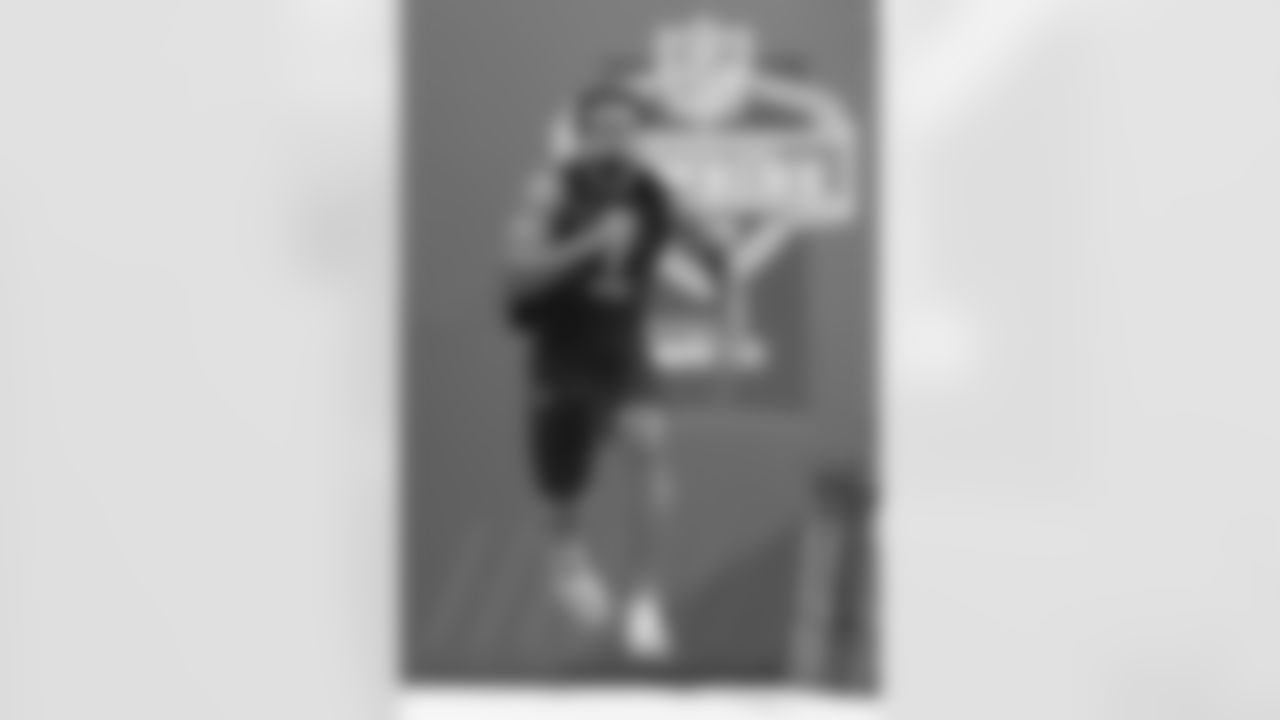 North Carolina running back Ty Chandler runs the 40-yard dash during the NFL football scouting combine, Friday, March 4, 2022, in Indianapolis. (AP Photo/Darron Cummings)