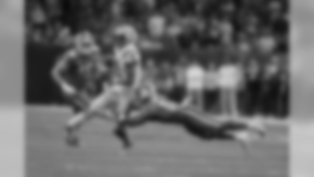 LSU wide receiver Justin Jefferson is tackled by Clemson safety K'Von Wallace during the second half of a NCAA College Football Playoff national championship game Monday, Jan. 13, 2020, in New Orleans. (AP Photo/Gerald Herbert)